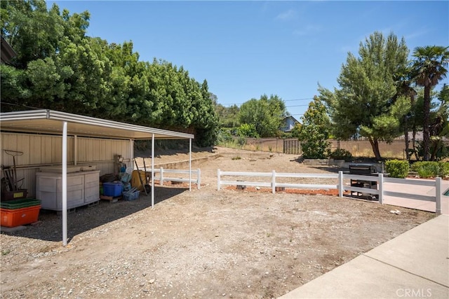 8652 Surrey Ln, Rancho Cucamonga, CA 91701 - view of yard featuring an exterior structure