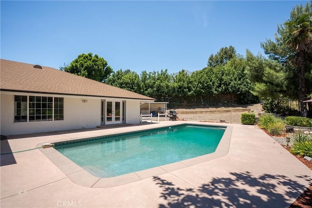 8652 Surrey Ln, Rancho Cucamonga, CA 91701 - view of pool with french doors and a patio