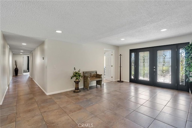 8652 Surrey Ln, Rancho Cucamonga, CA 91701 - entrance foyer with recessed lighting, a textured ceiling, and tile patterned floors