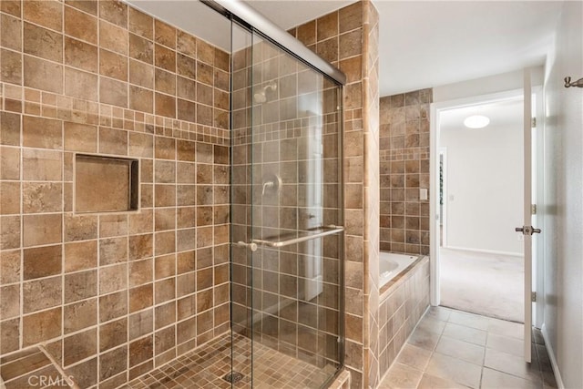 8652 Surrey Ln, Rancho Cucamonga, CA 91701 - bathroom with a stall shower, a garden tub, and tile patterned flooring