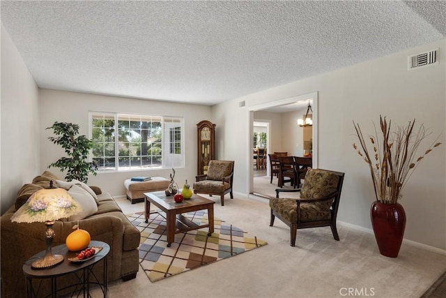 8652 Surrey Ln, Rancho Cucamonga, CA 91701 - living room with a textured ceiling, light carpet, and a chandelier
