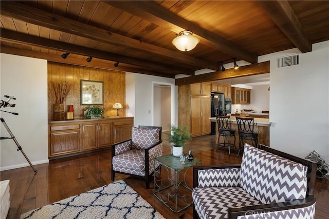 8652 Surrey Ln, Rancho Cucamonga, CA 91701 - living area featuring a wood ceiling with exposed beams, dark wood-style floors, and track lighting