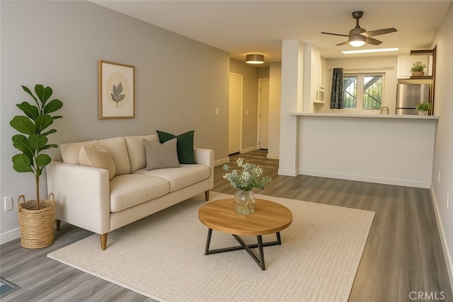 6675 Mission Gorge Rd Unit A114, San Diego, CA 92120 - living room featuring wood finished floors and a ceiling fan