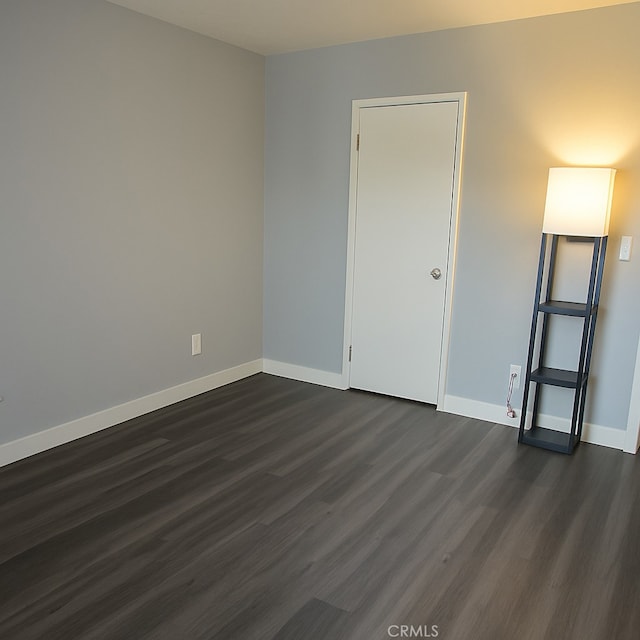6675 Mission Gorge Rd Unit A114, San Diego, CA 92120 - empty room featuring dark wood finished floors and baseboards