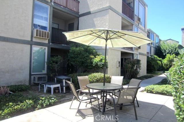 6675 Mission Gorge Rd Unit A114, San Diego, CA 92120 - view of patio featuring outdoor dining area