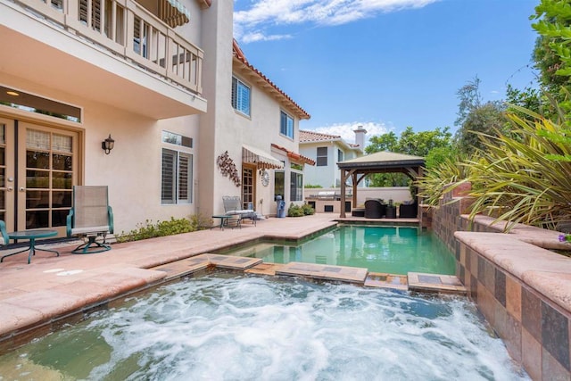 4883 Bradshaw Ct, San Diego, CA 92130 - view of pool featuring a gazebo, a patio, and a pool with connected hot tub