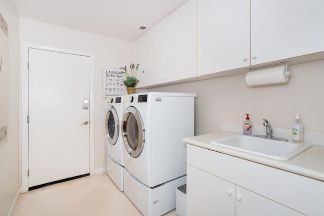 4883 Bradshaw Ct, San Diego, CA 92130 - laundry area featuring washer and dryer and cabinet space