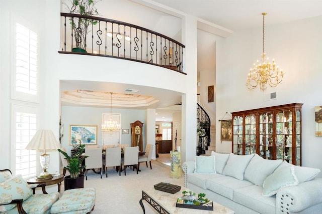 4883 Bradshaw Ct, San Diego, CA 92130 - carpeted living room featuring a chandelier, stairs, and high vaulted ceiling