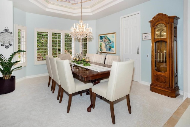 4883 Bradshaw Ct, San Diego, CA 92130 - dining room with a tray ceiling, a chandelier, and light carpet