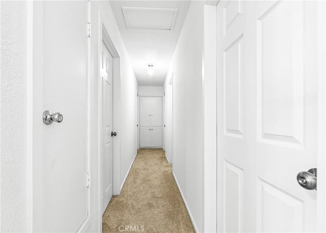 16271 Fairway Ln, Huntington Beach, CA 92649 - hallway with light colored carpet and attic access