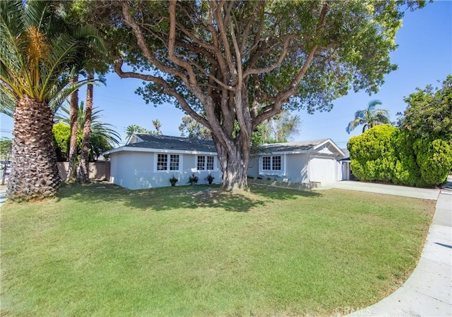 16271 Fairway Ln, Huntington Beach, CA 92649 - ranch-style home with driveway, a front lawn, and stucco siding
