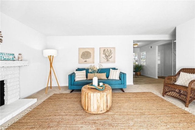 16271 Fairway Ln, Huntington Beach, CA 92649 - carpeted living area with a brick fireplace and baseboards