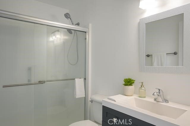 1386 E Madison Ave Unit 21, El Cajon, CA 92021 - full bath with a stall shower and vanity