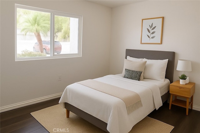 1386 E Madison Ave Unit 21, El Cajon, CA 92021 - bedroom featuring dark wood-style flooring and baseboards