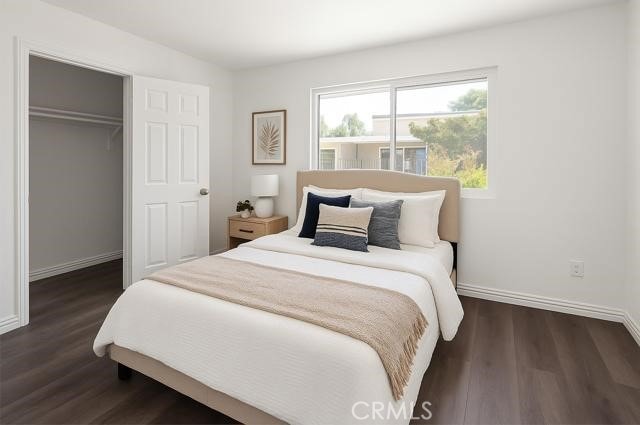 1386 E Madison Ave Unit 21, El Cajon, CA 92021 - bedroom with wood finished floors and a closet