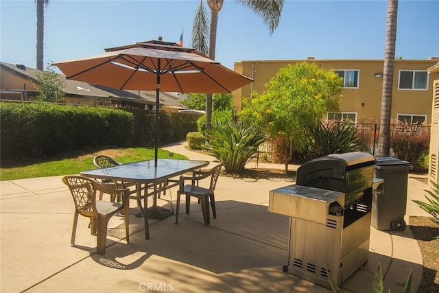 1386 E Madison Ave Unit 21, El Cajon, CA 92021 - view of patio / terrace featuring outdoor dining space and a grill