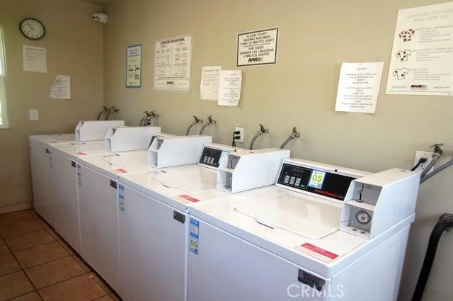 1386 E Madison Ave Unit 21, El Cajon, CA 92021 - shared laundry with independent washer and dryer and tile patterned floors