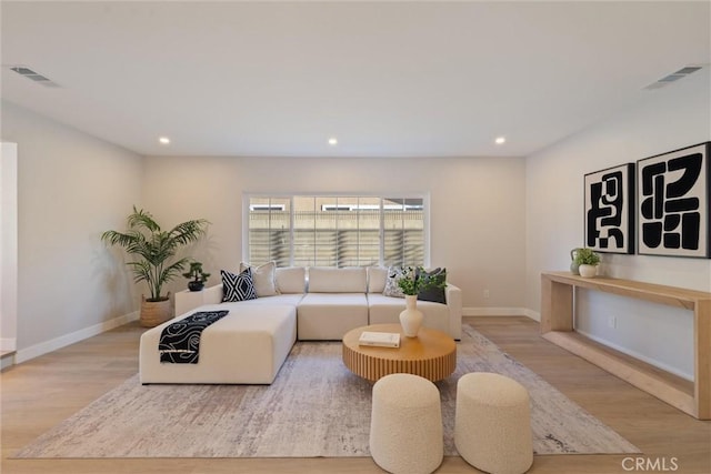 7372 Brian Ln, La Palma, CA 90623 - living area featuring wood finished floors and recessed lighting