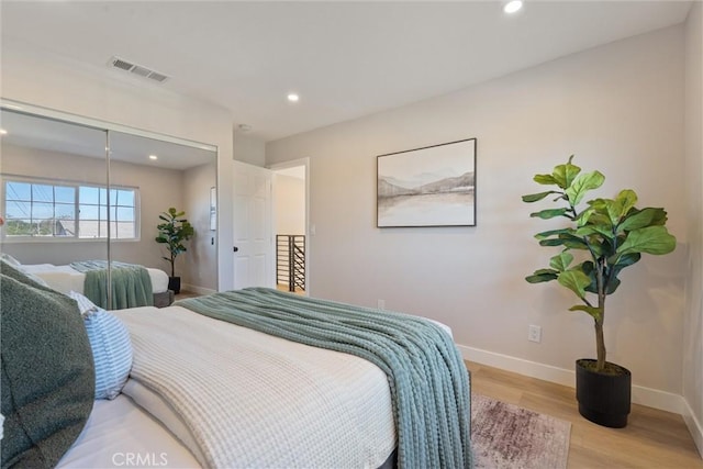 7372 Brian Ln, La Palma, CA 90623 - bedroom with light wood-type flooring, recessed lighting, and a closet