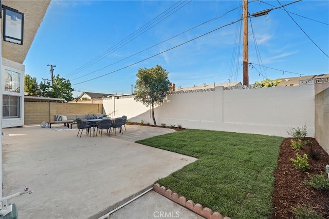 7372 Brian Ln, La Palma, CA 90623 - fenced backyard with a patio and an outdoor hangout area