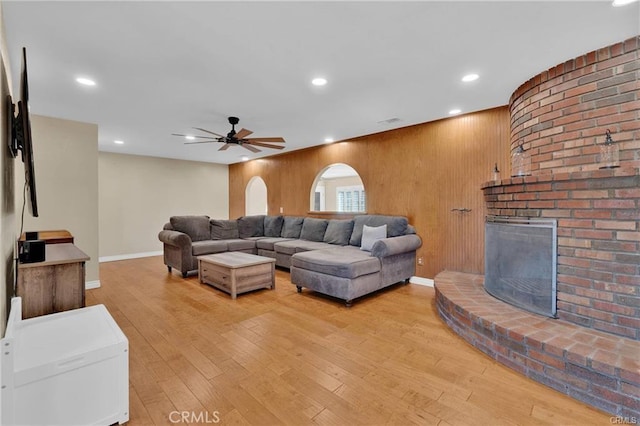 19055 Seaforth St, Hesperia, CA 92345 - living area with ceiling fan, light wood-type flooring, wooden walls, and recessed lighting