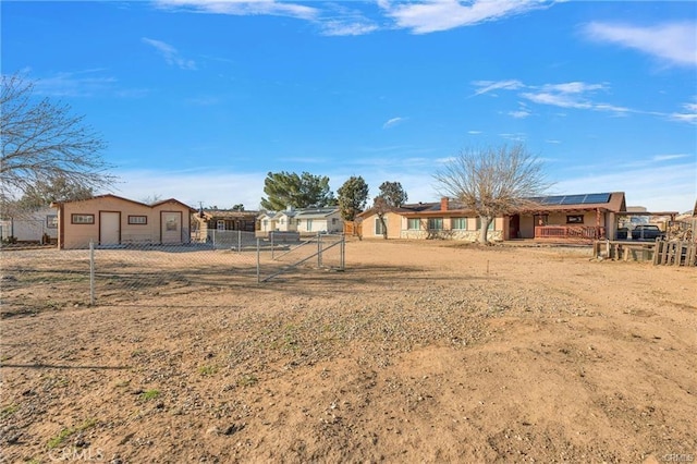 19055 Seaforth St, Hesperia, CA 92345 - view of yard featuring a garage and a gate