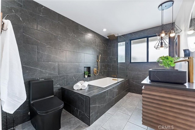 29951 Morongo Pl, Laguna Niguel, CA 92677 - full bath featuring tile walls, vanity, and tiled shower / bath combo