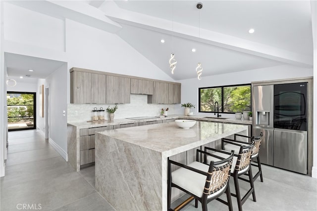 29951 Morongo Pl, Laguna Niguel, CA 92677 - kitchen featuring stainless steel fridge, modern cabinets, a center island, tasteful backsplash, and recessed lighting