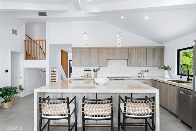 29951 Morongo Pl, Laguna Niguel, CA 92677 - kitchen with dishwasher, high vaulted ceiling, modern cabinets, a kitchen bar, and light stone countertops