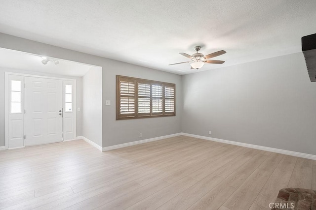 309 N Leland Ave, West Covina, CA 91790 - entrance foyer with ceiling fan, light wood finished floors, and a textured ceiling