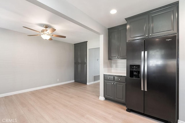 309 N Leland Ave, West Covina, CA 91790 - kitchen with stainless steel refrigerator with ice dispenser, a ceiling fan, light wood-style floors, light countertops, and gray cabinets