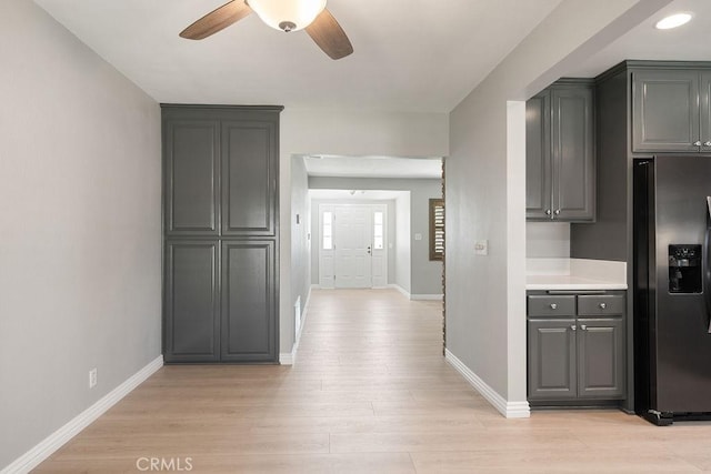 309 N Leland Ave, West Covina, CA 91790 - kitchen with stainless steel refrigerator with ice dispenser, ceiling fan, light wood-type flooring, light countertops, and gray cabinets