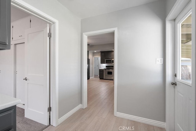 309 N Leland Ave, West Covina, CA 91790 - hall featuring baseboards and light wood-type flooring