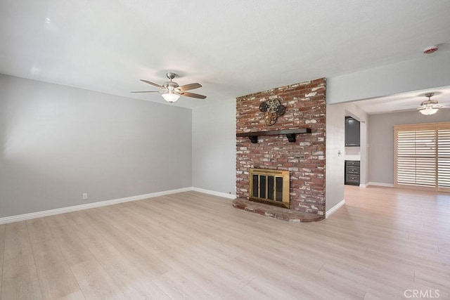309 N Leland Ave, West Covina, CA 91790 - unfurnished living room with ceiling fan, wood finished floors, and a fireplace