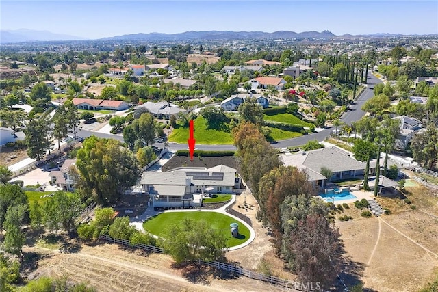 40630 Calle Torcida, Temecula, CA 92591 - aerial overview of property's location with nearby suburban area and a mountain backdrop
