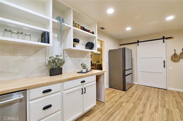 40630 Calle Torcida, Temecula, CA 92591 - kitchen featuring freestanding refrigerator, open shelves, a barn door, butcher block countertops, and recessed lighting
