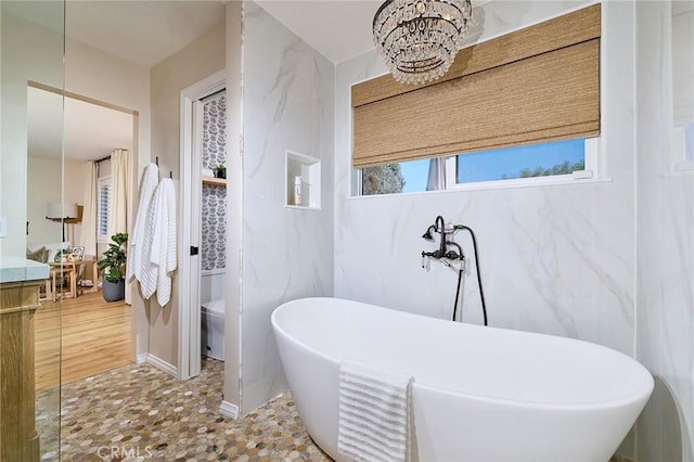 40630 Calle Torcida, Temecula, CA 92591 - bathroom featuring vanity, a freestanding bath, and a chandelier