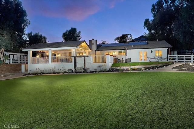 40630 Calle Torcida, Temecula, CA 92591 - view of front of home with roof mounted solar panels and a chimney