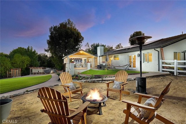 40630 Calle Torcida, Temecula, CA 92591 - patio terrace at dusk featuring a fire pit and a patio