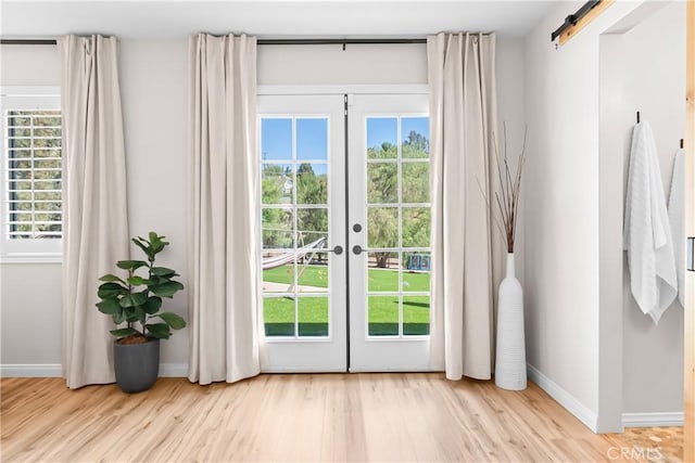 40630 Calle Torcida, Temecula, CA 92591 - doorway to outside featuring wood finished floors, french doors, and plenty of natural light