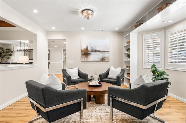 40630 Calle Torcida, Temecula, CA 92591 - living room featuring wood finished floors, a chandelier, and recessed lighting