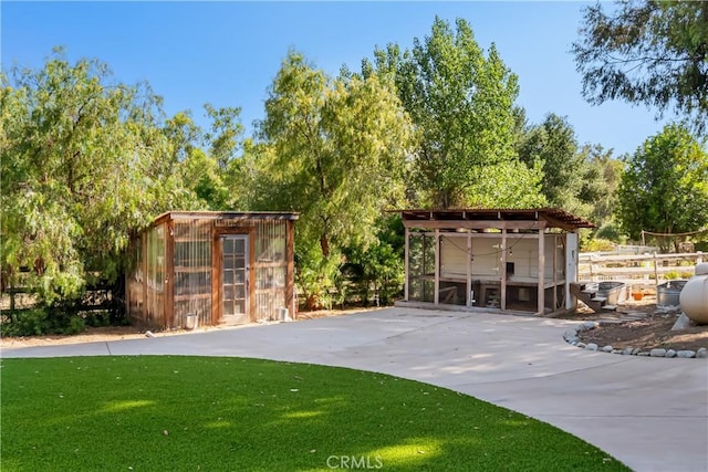 40630 Calle Torcida, Temecula, CA 92591 - view of outdoor structure featuring view of wooded area