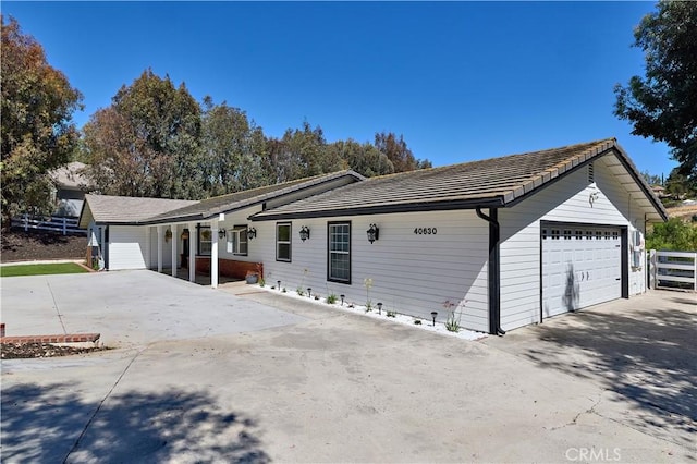 40630 Calle Torcida, Temecula, CA 92591 - view of front of house with a detached garage and a tile roof