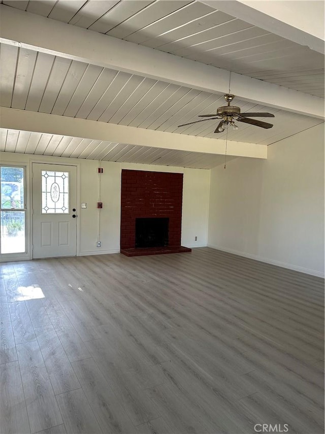 1322 S Walnut Ave, West Covina, CA 91790 - unfurnished living room featuring a ceiling fan, wood finished floors, and a fireplace