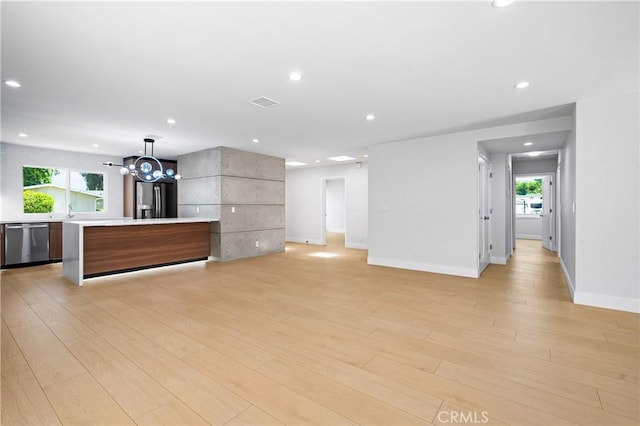 16701 Kalisher, Granada Hills, CA 91344 - unfurnished living room with recessed lighting and light wood-style flooring