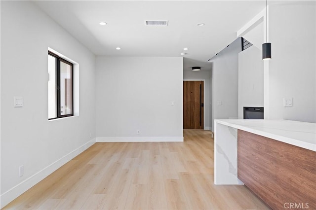 16701 Kalisher, Granada Hills, CA 91344 - unfurnished living room featuring light wood-type flooring and recessed lighting