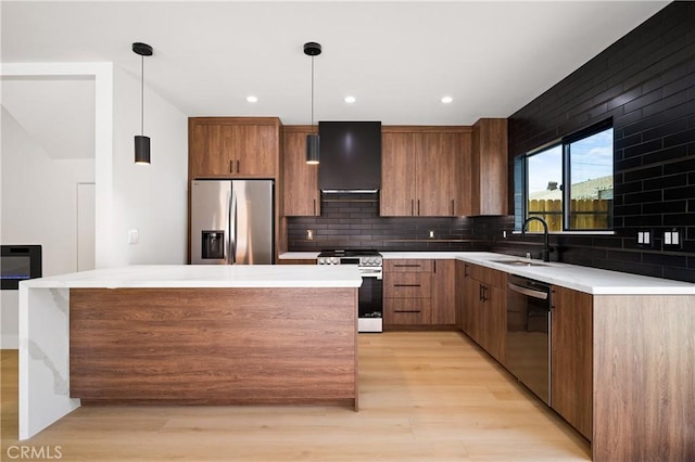 16701 Kalisher, Granada Hills, CA 91344 - kitchen with appliances with stainless steel finishes, extractor fan, tasteful backsplash, light wood-type flooring, and light countertops