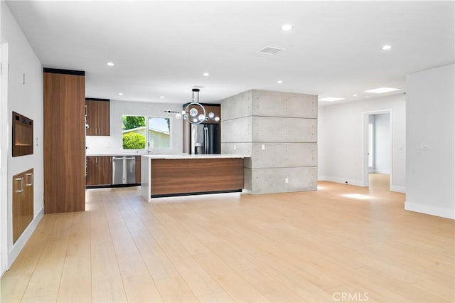 16701 Kalisher, Granada Hills, CA 91344 - unfurnished living room with a chandelier, recessed lighting, and light wood-type flooring