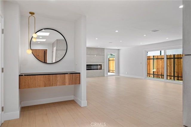 16701 Kalisher, Granada Hills, CA 91344 - corridor with plenty of natural light, light wood-style flooring, and recessed lighting