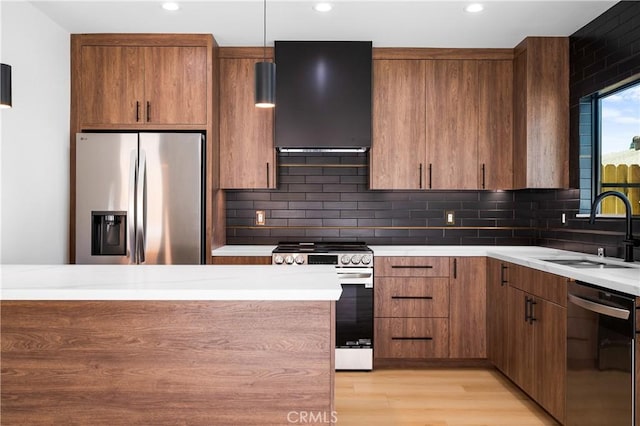 16701 Kalisher, Granada Hills, CA 91344 - kitchen with appliances with stainless steel finishes, exhaust hood, light countertops, tasteful backsplash, and brown cabinets